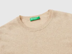 Beige crew neck sweater in pure Merino wool