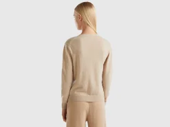 Beige V-neck cardigan in pure Merino wool
