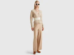 Beige V-neck cardigan in pure Merino wool