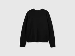 Black cardigan in pure Merino wool