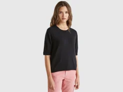 Black short sleeve sweater in pure Merino wool