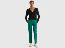 Black V-neck cardigan in pure Merino wool