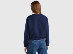 Bomber jacket with bouclé look
