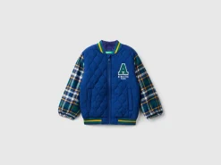 Bomber jacket with tartan sleeves