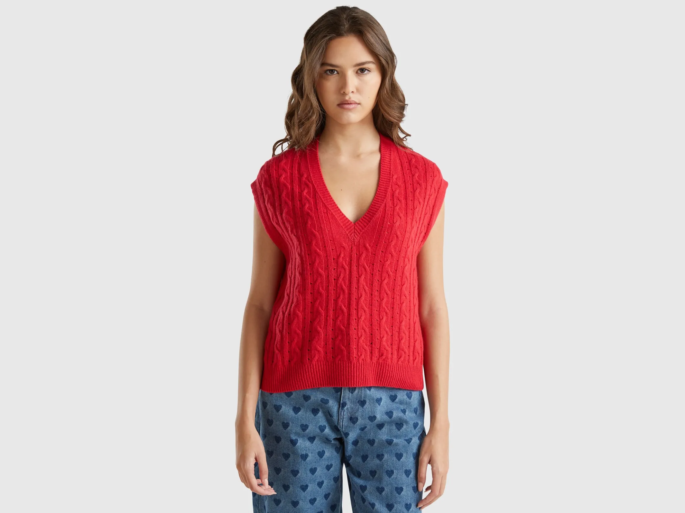 Boxy fit vest with cable knit and perforations