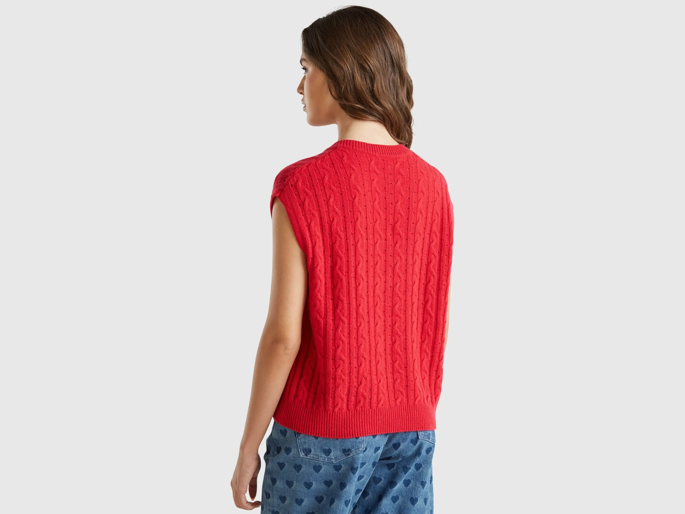 Boxy fit vest with cable knit and perforations