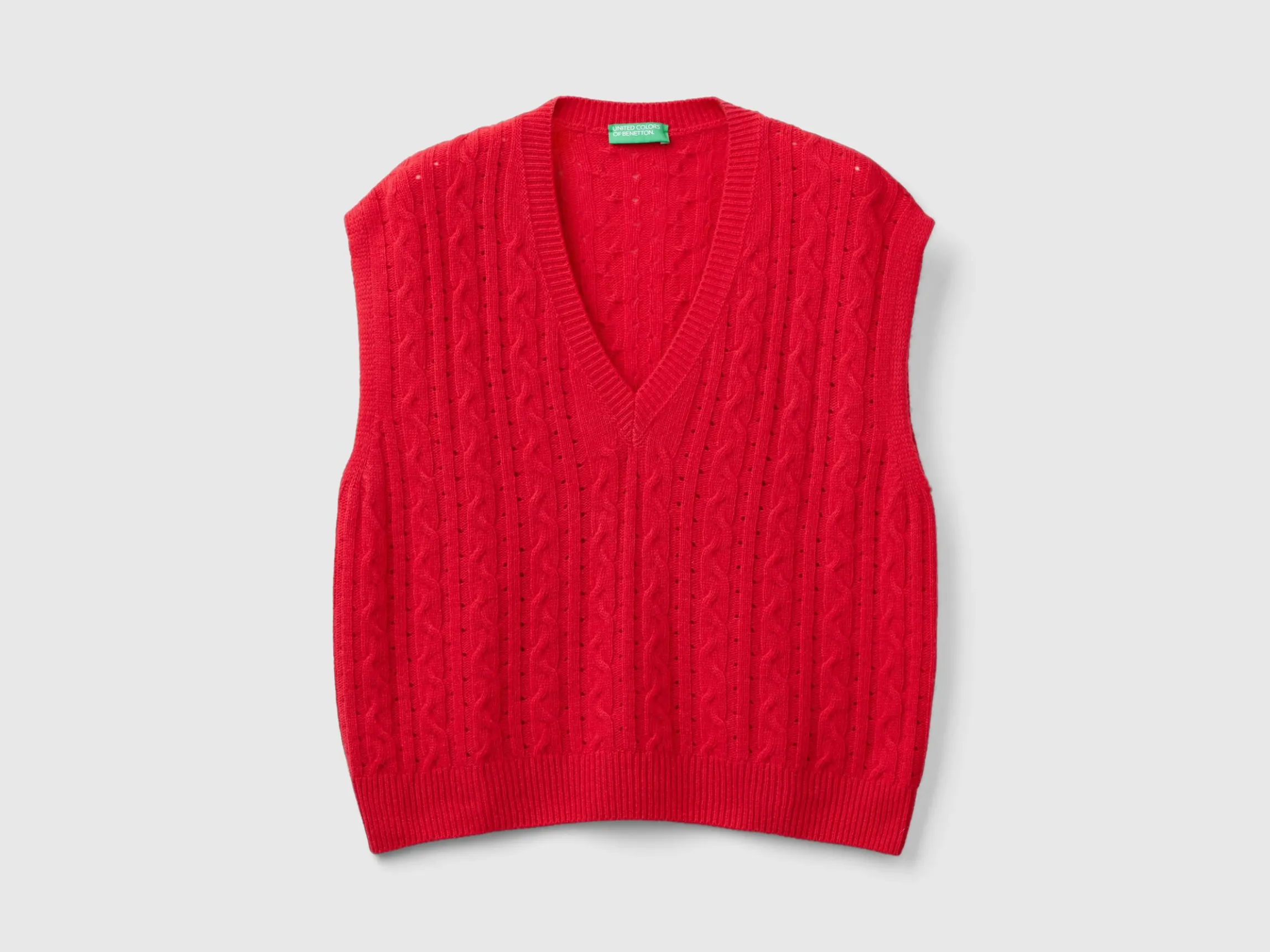 Boxy fit vest with cable knit and perforations