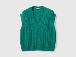 Boxy fit vest with cable knit and perforations
