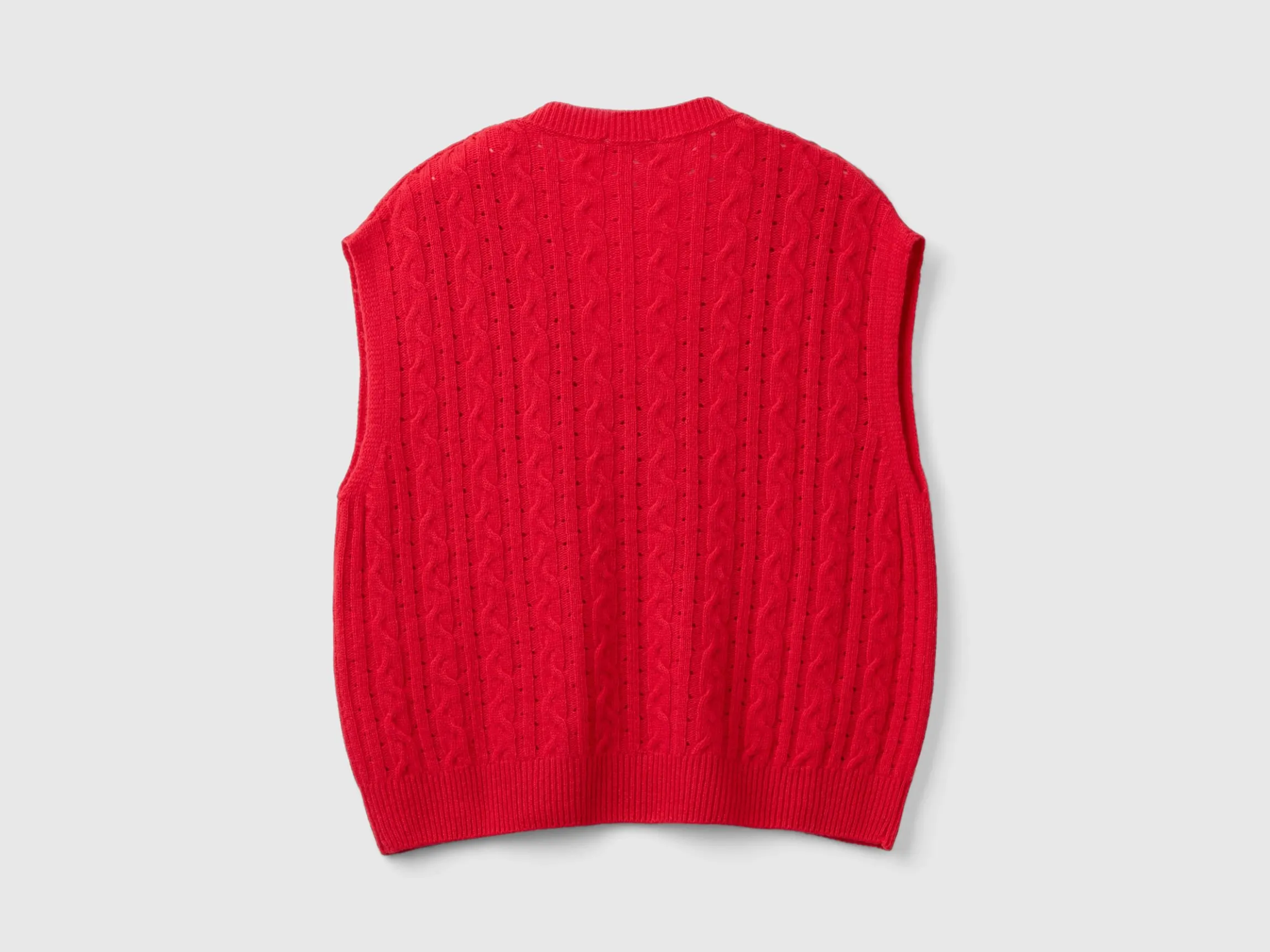 Boxy fit vest with cable knit and perforations