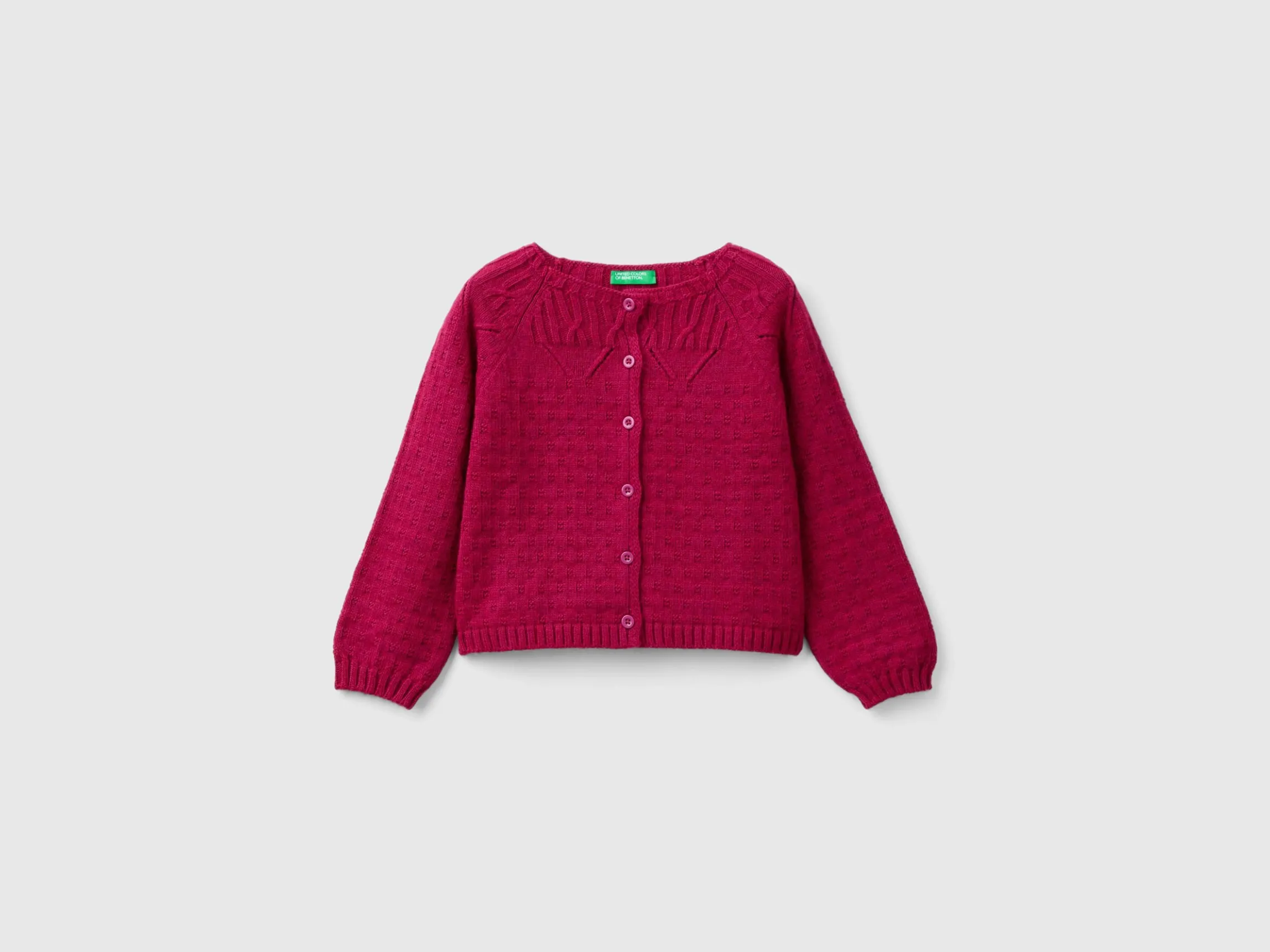 Cardigan with perforated details