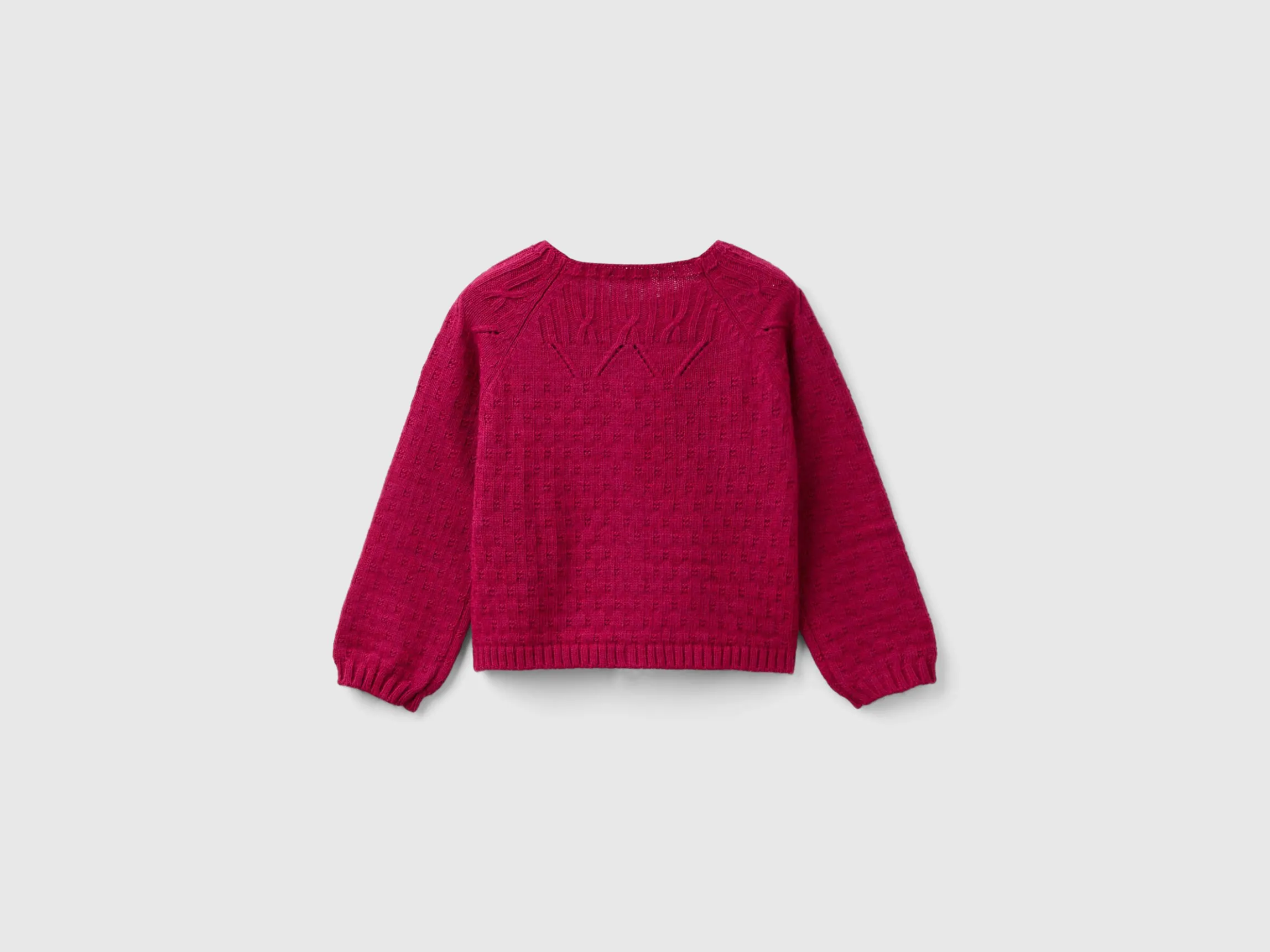 Cardigan with perforated details