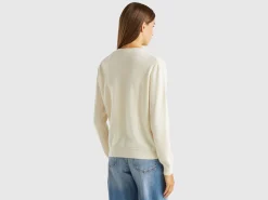 Cream crew neck cardigan in pure Merino wool