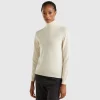 Cream turtleneck sweater in pure Merino wool