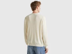 Creamy white crew neck sweater in pure Merino wool