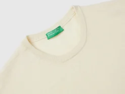 Creamy white crew neck sweater in pure Merino wool