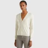 Creamy white V- neck cardigan in pure Merino wool