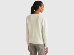 Creamy white V- neck cardigan in pure Merino wool