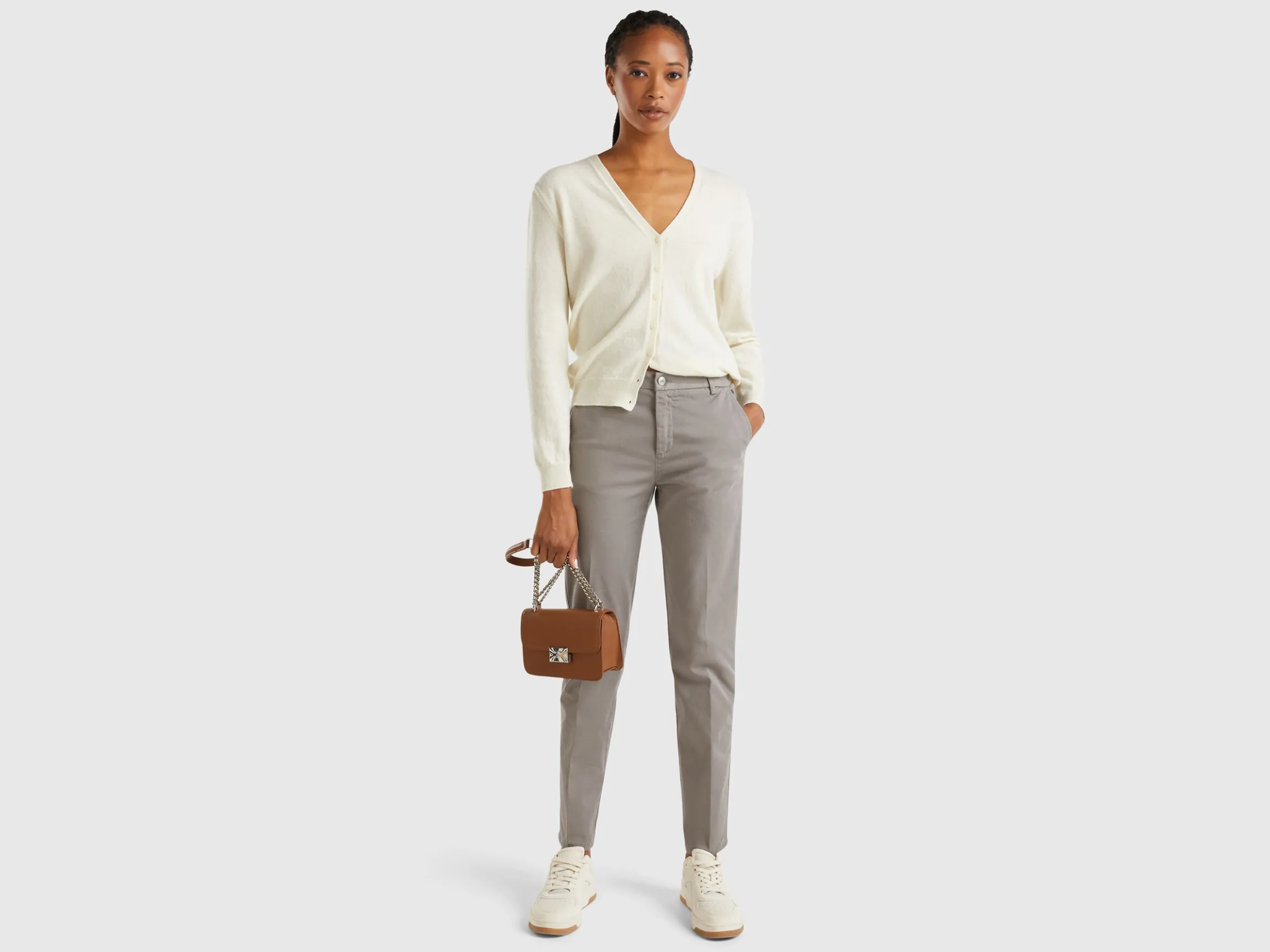 Creamy white V- neck cardigan in pure Merino wool