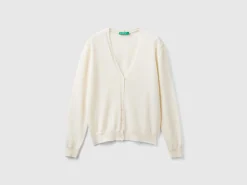 Creamy white V- neck cardigan in pure Merino wool