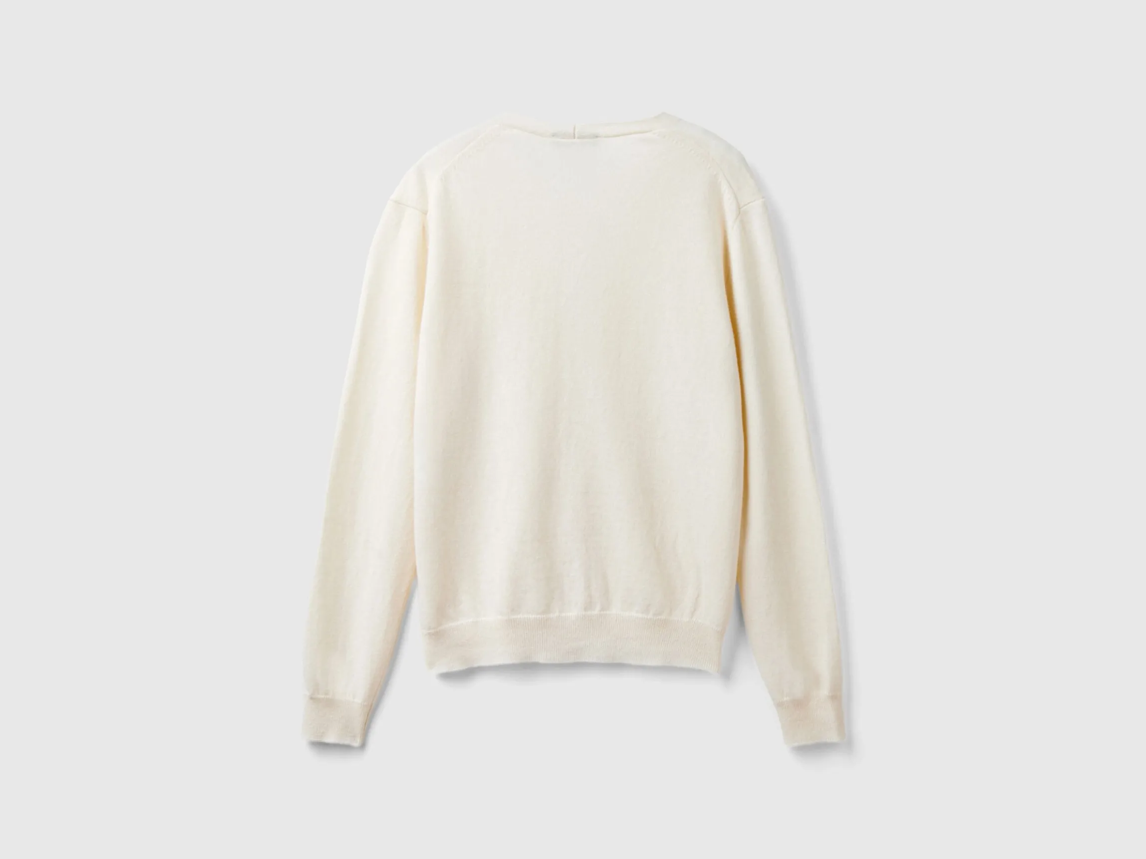 Creamy white V- neck cardigan in pure Merino wool