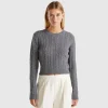 Cropped sweater with cable knit and perforations