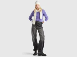 Cropped sweater with cable knit and perforations