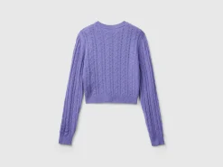 Cropped sweater with cable knit and perforations