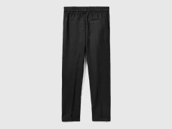 Cropped trousers in 100% linen