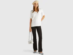 Flared jeans in recycled cotton blend