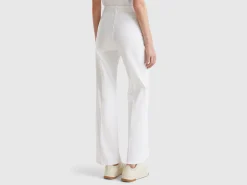 Flared trousers in stretch cotton