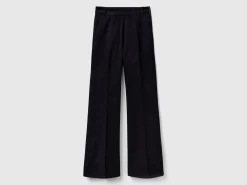 Flared trousers in stretch cotton