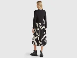 Flowy dress with patterned skirt