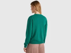 Forest green V-neck cardigan in pure Merino wool
