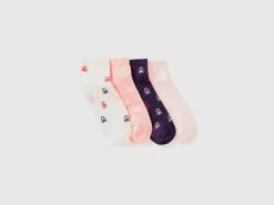Four pairs of short socks with logos