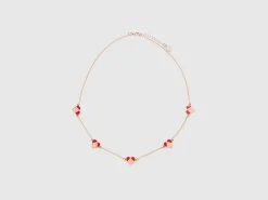 Gold necklace with hearts