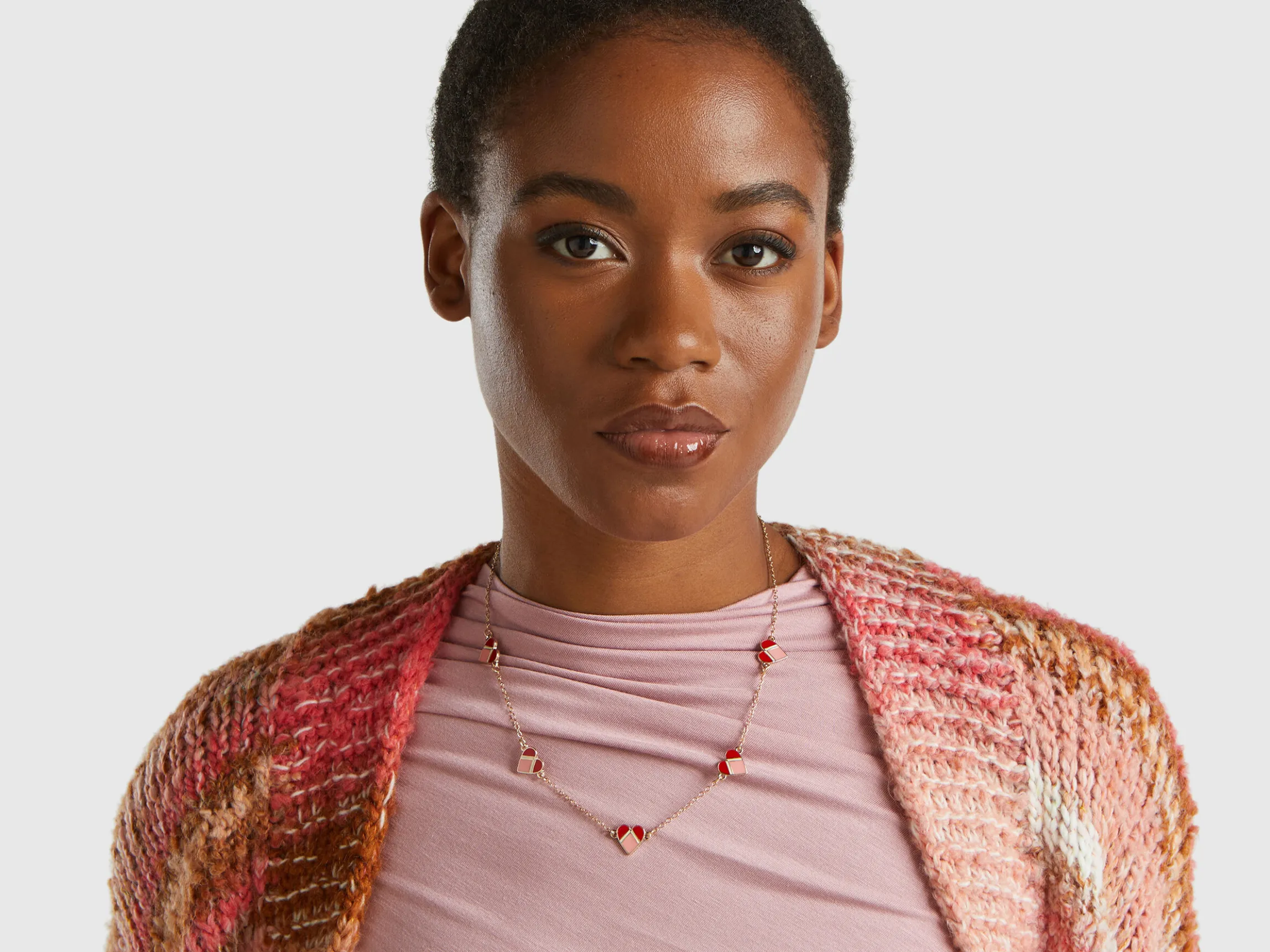 Gold necklace with hearts