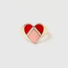 Gold ring with heart motif