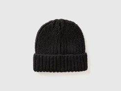 Hat with rhinestone logo