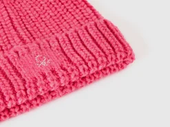 Hat with rhinestone logo