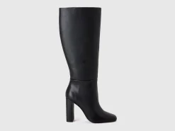 Heeled boots in imitation leather