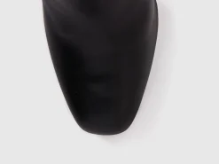 Heeled boots in imitation leather