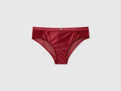 High-waisted briefs in glossy fabric