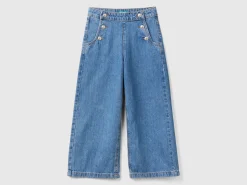 Jeans with jewel effect applique