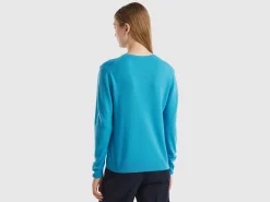 Light blue crew neck cardigan in pure Merino wool