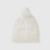 Lined hat with pom pom