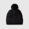 Lined hat with pom pom