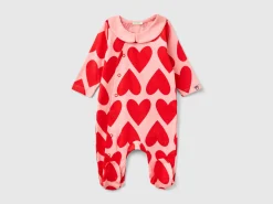 Long pink onesie with heart print