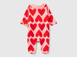 Long pink onesie with heart print