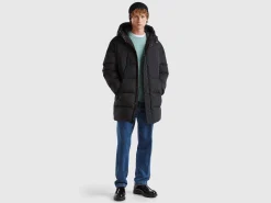 Long puffer jacket with recycled feathers