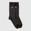 Long socks with black hearts